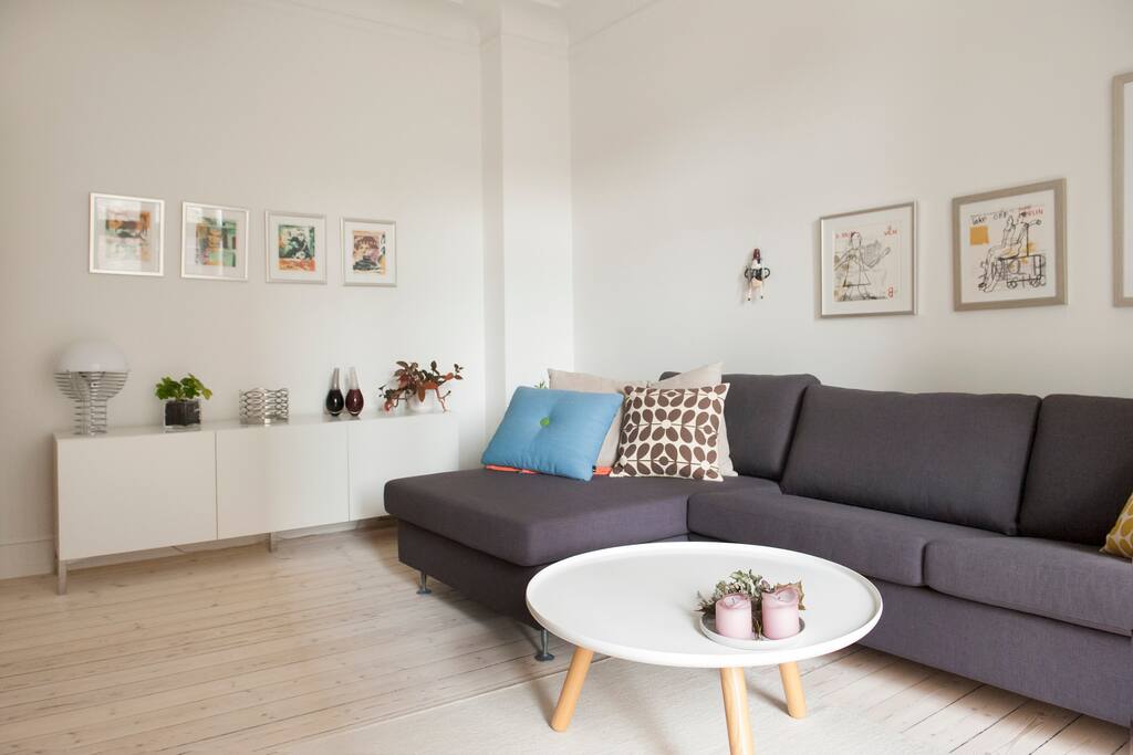This room is facing the courtyard where you will find a large balcony. The sofa is a sofabed and sleeps 2 people