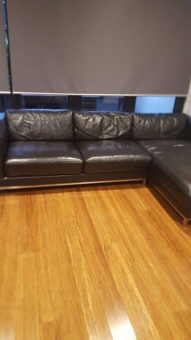 Leather Couch in the living room - I can prove a mattress if you require which can be used on the living room floor