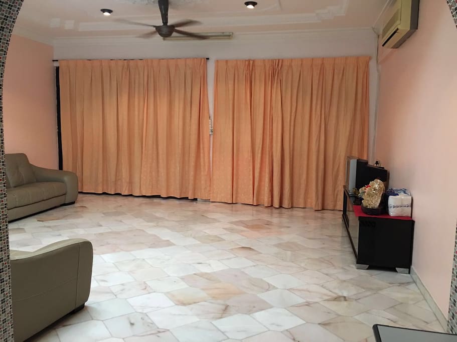Here are the spacious living hall with air conditioning and Astro TV Channel