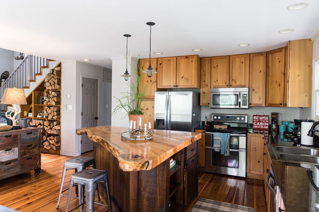 Fully stocked kitchen. Large island perfect for gathering.