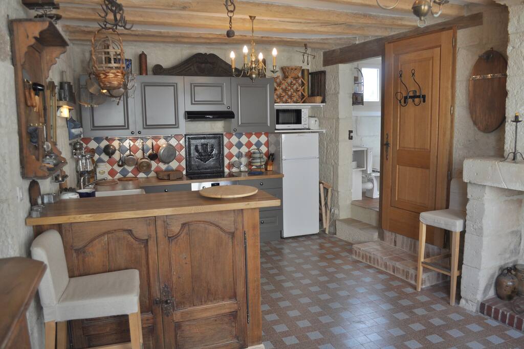 Kitchen with bathroom located to the right