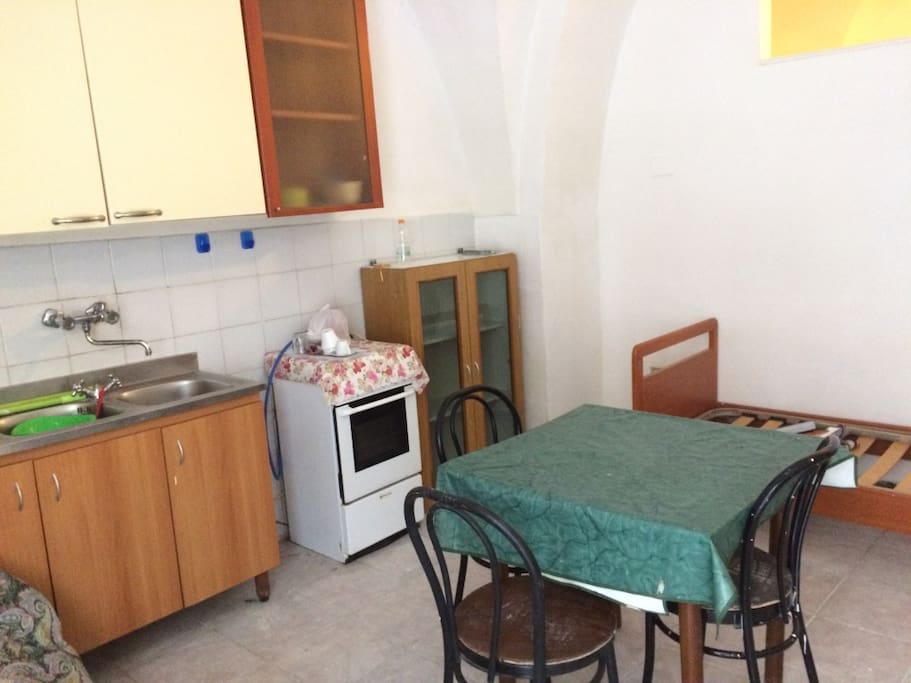 soggiorno con angolo cottura