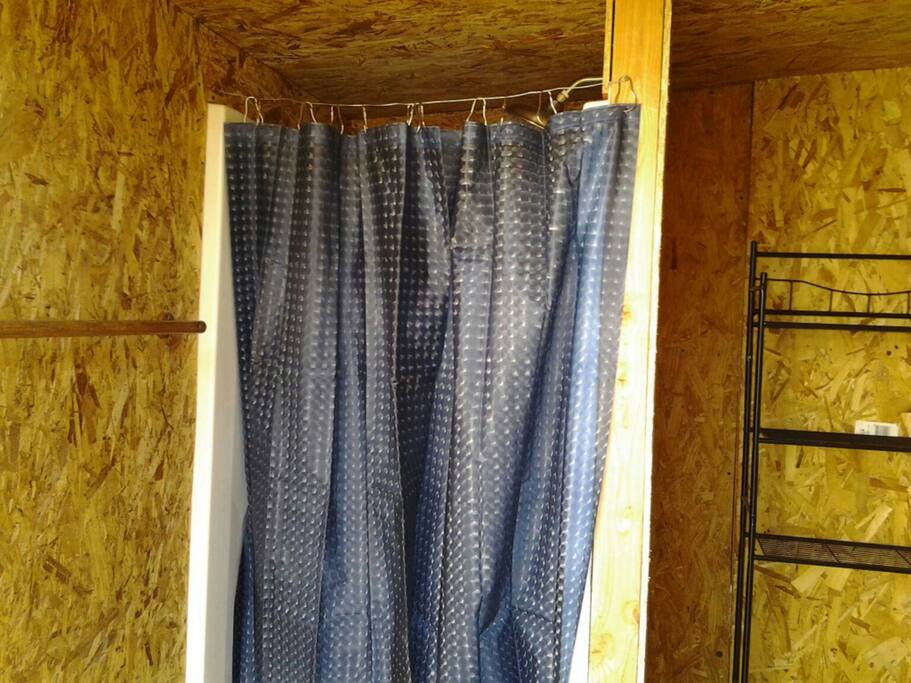 Shower in the ladies bathroom.
