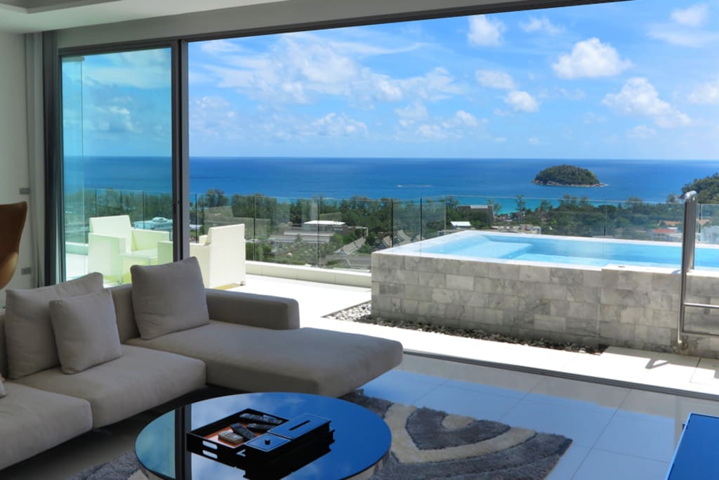 Enjoy the stunning view of the ocean while you relax in the private jacuzzi