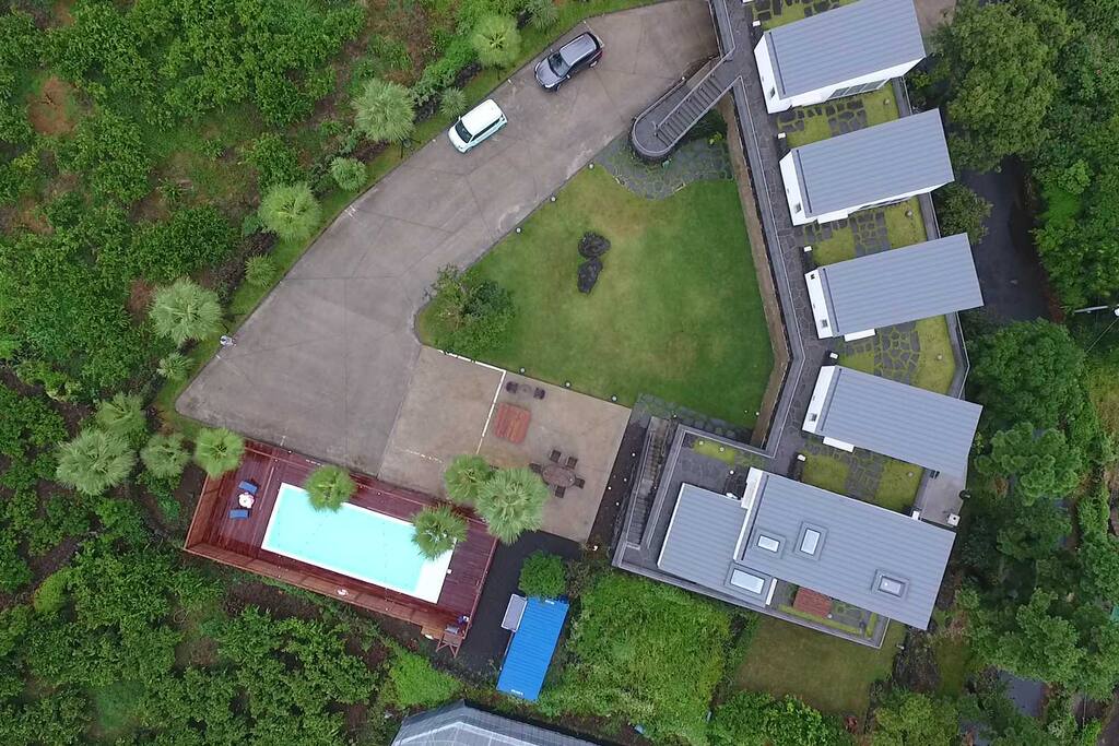 Sky view! Each unit is separate and private. Swimming pool besides the tangerine farm.