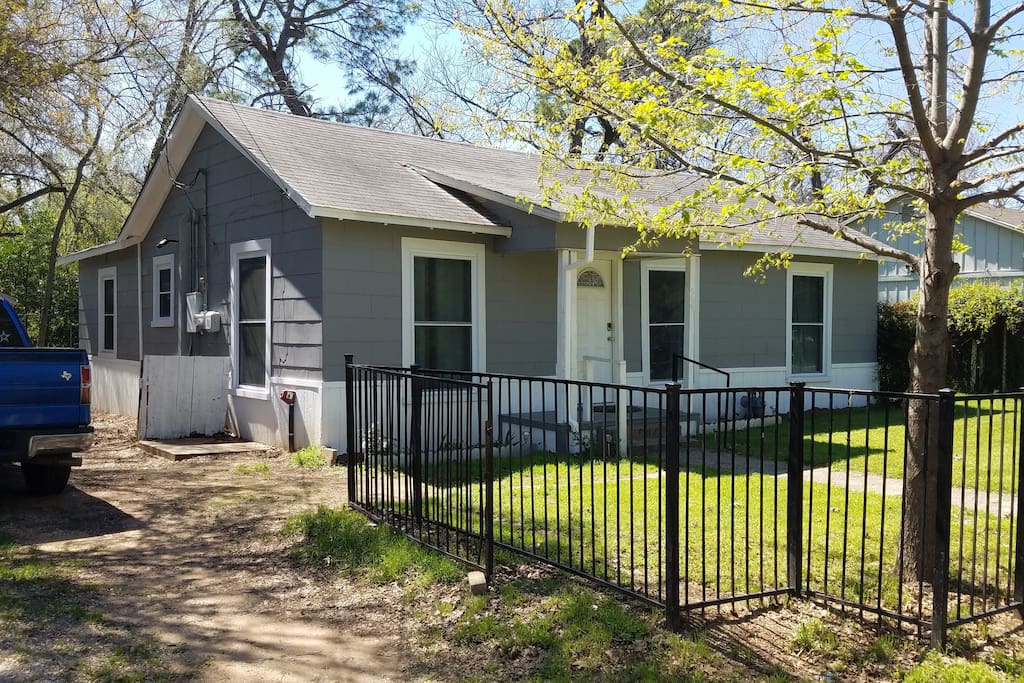 This rustic home in an established neighborhood features a large yard with shade trees in the back. New windows were recently installed. And, it offers ample parking close to AT&T Stadium.