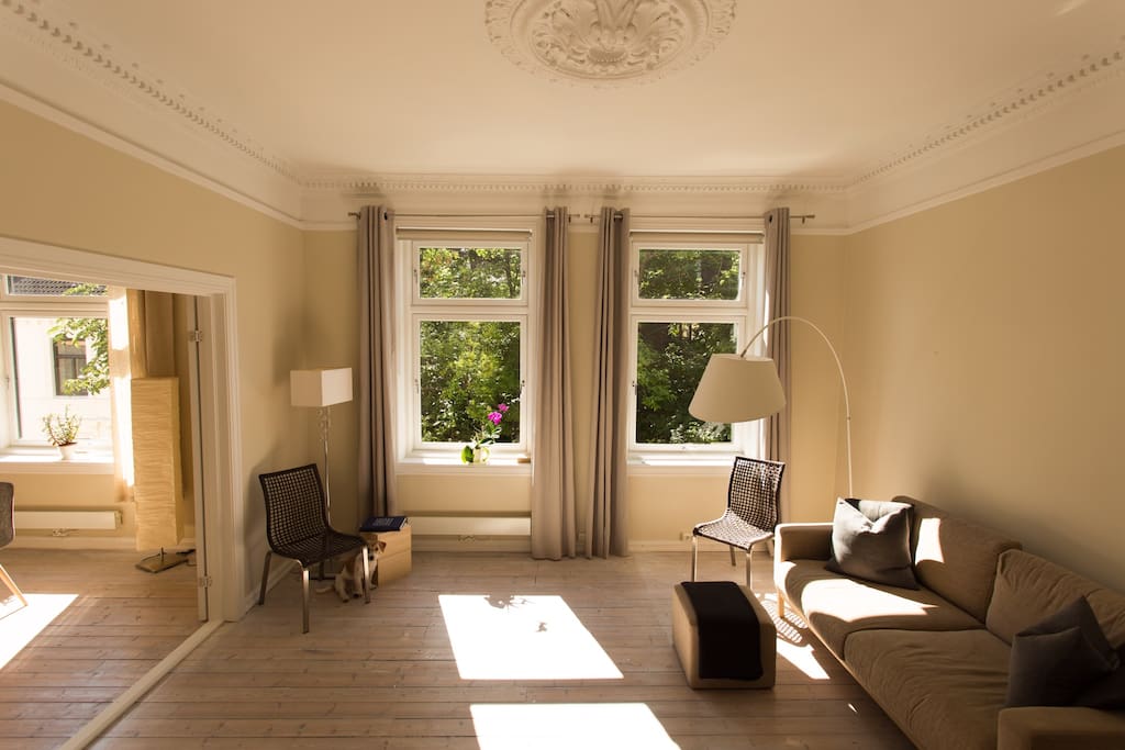 Living room with entrance to dining room
