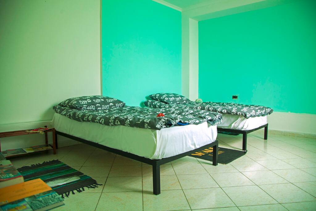 Elegantly designed private twin with shared new bathroom on the floor. The room has free wireless internet free of charge for our guests. In the room, for each bed, we provided reading lights, electricity plugs, clean sheets and towels.