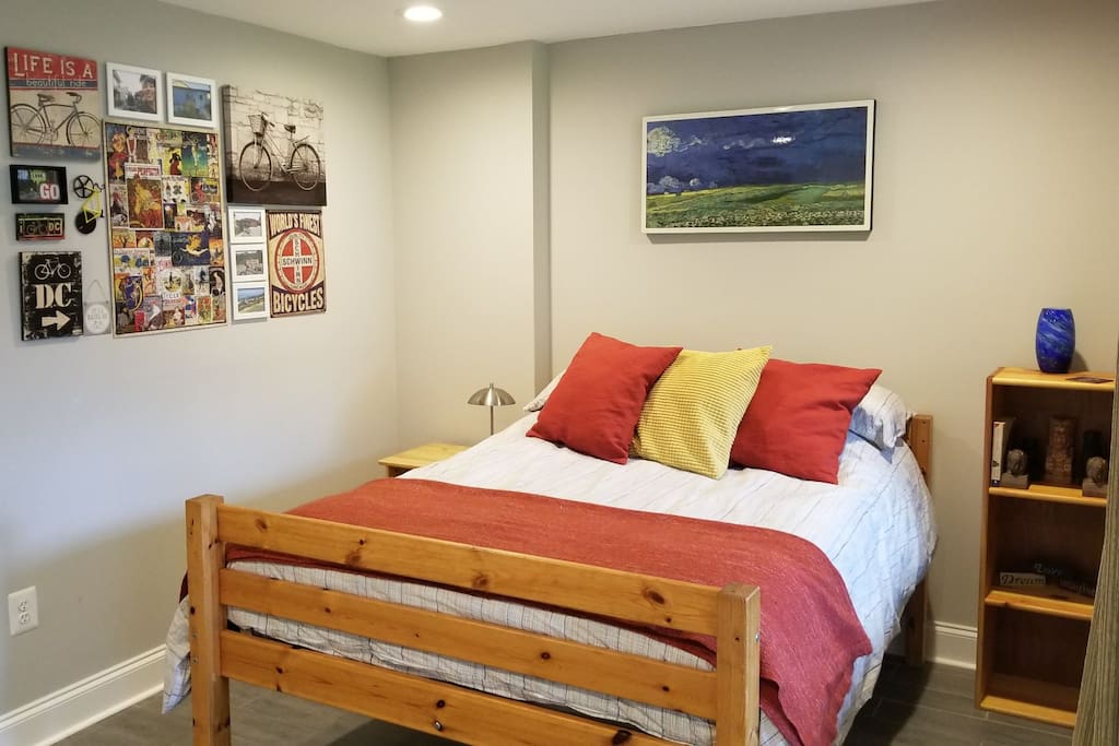 Private bedroom with full bed and bicycle-themed collage wall!