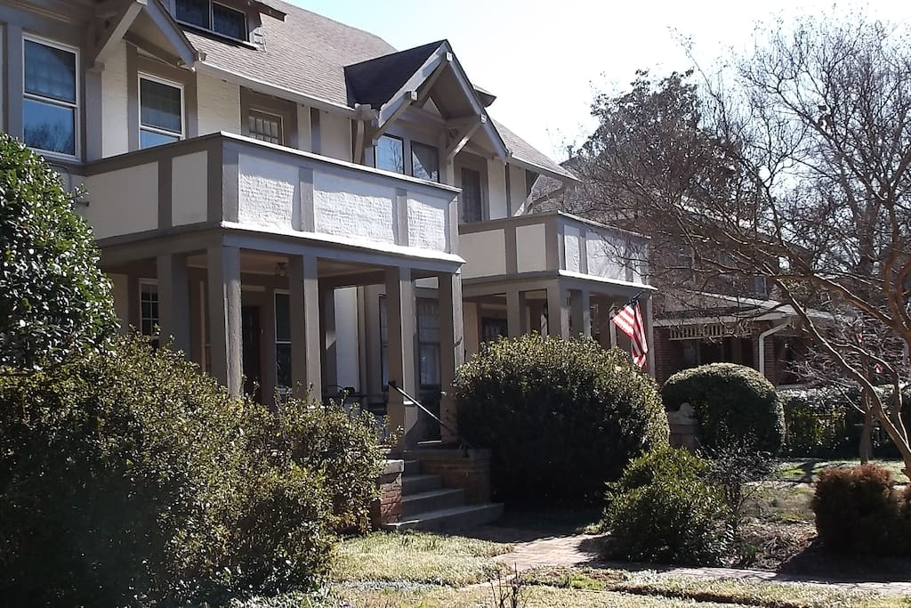 Front view with porch and balcony