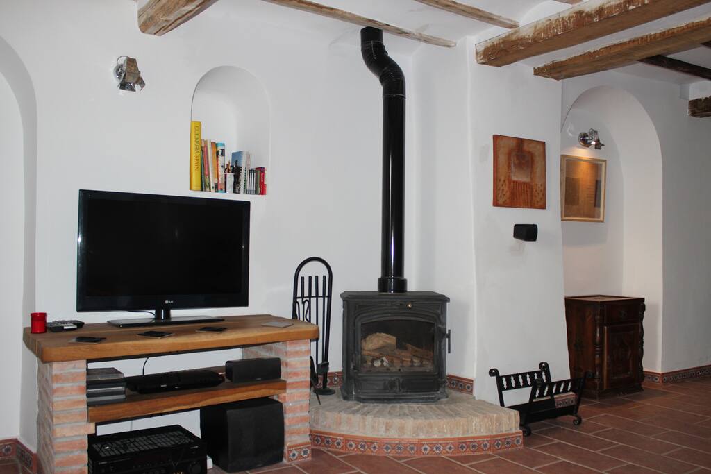Living room, TV and log burner