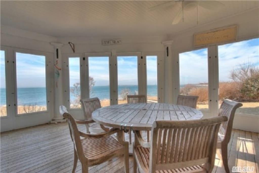 Screened in porch facing Long Island Sound