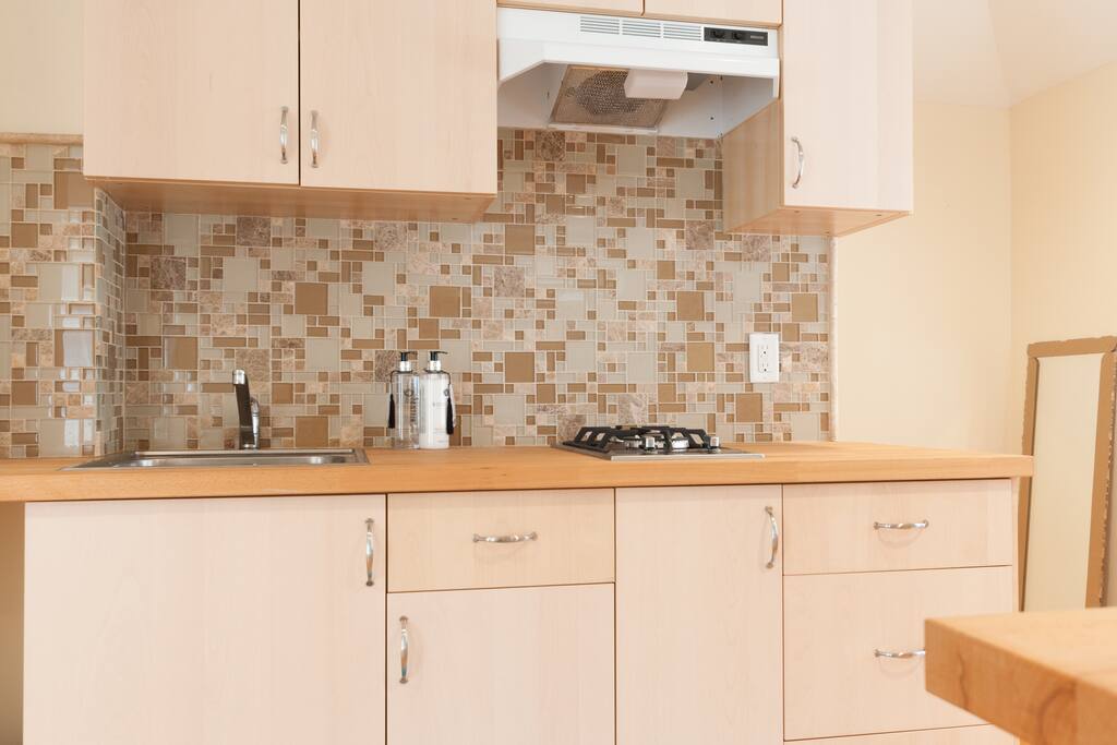 Glass tiles, wooden counters - little details that go along way and make the most discerning customer feel at home.
