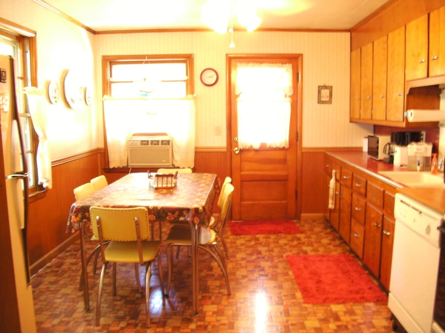 Large completely equipped kitchen with seating of 8
