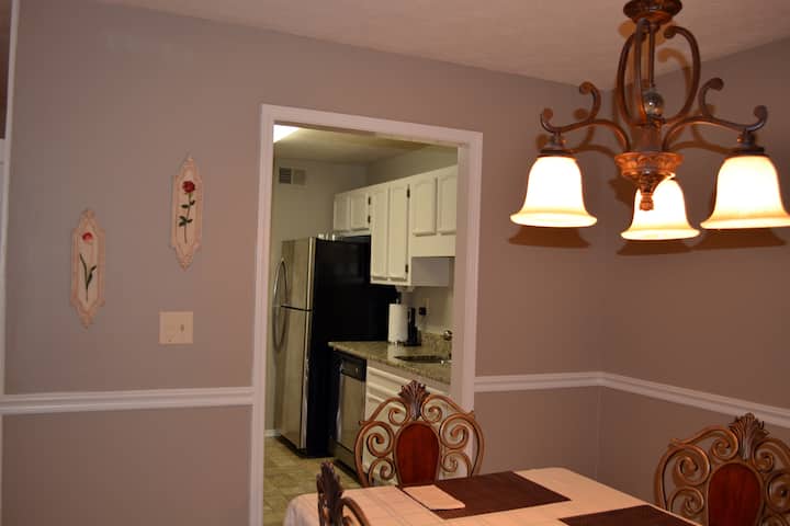 Condo bedroom with queen bed
