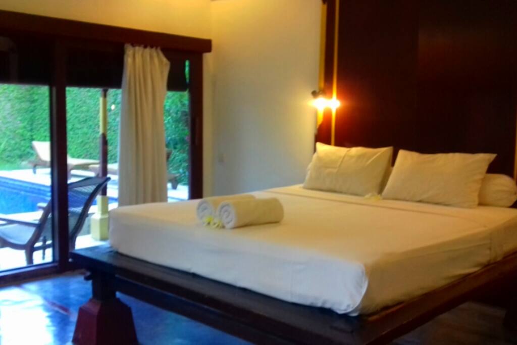 The master bedroom with the pool view