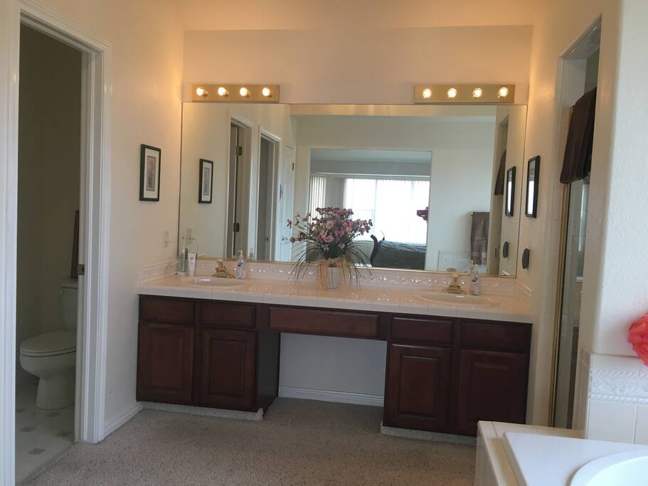 Bathroom with 2 separate sinks.