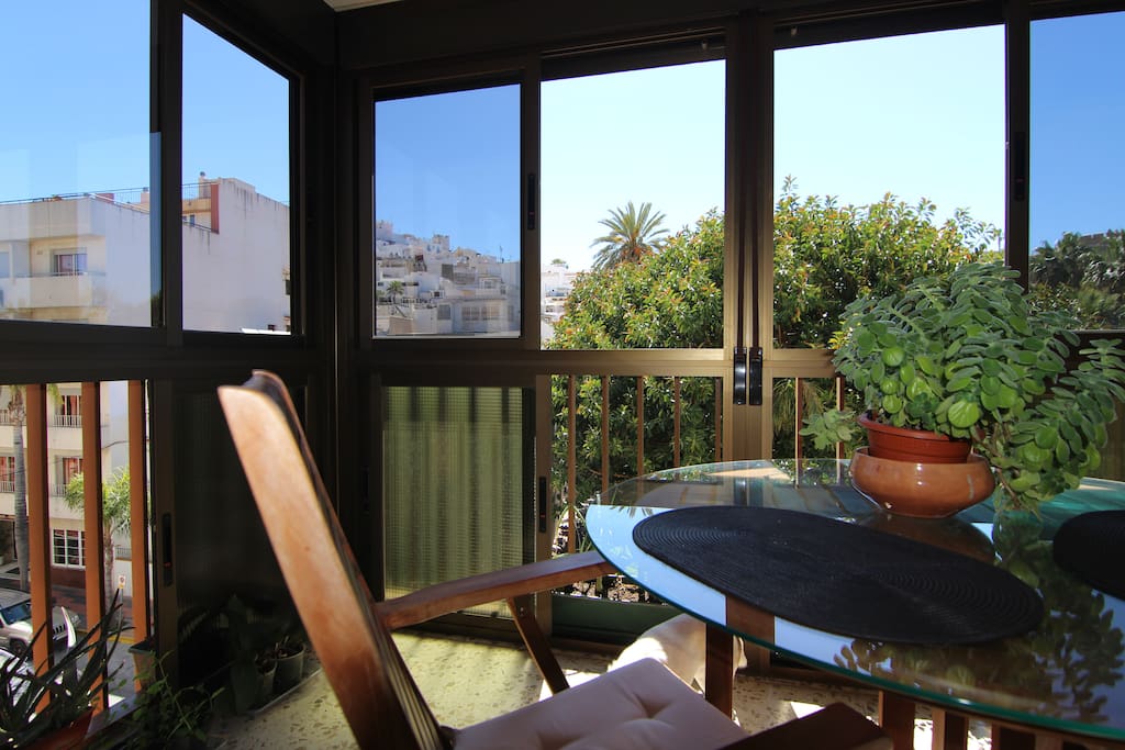 The terrace with views to the park and castillo of Almunecar with sun in the morning.