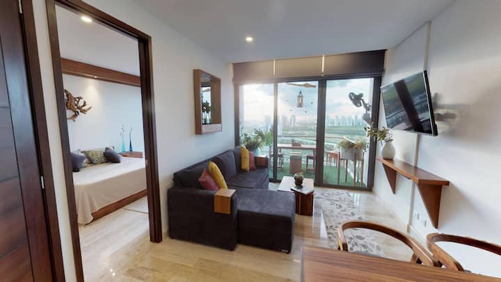 Izba s výhľadom na golfové ihrisko „Puerto Cancun“ zvnútra apartmánu sa naskytá výhľad na golfové ihrisko „Puerto Cancun“.
