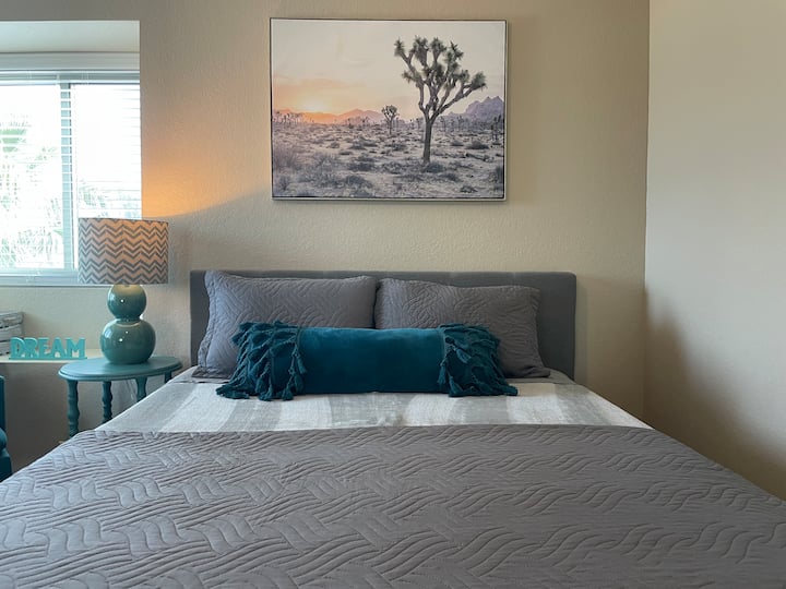 Comfy bedding & queen mattress.