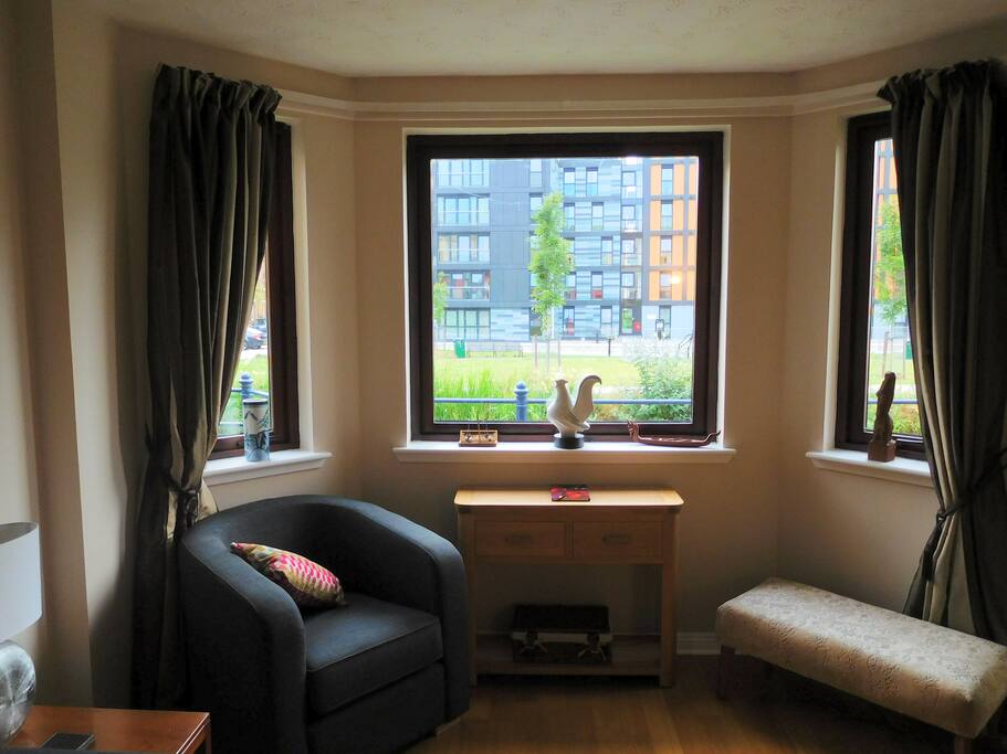 Bay window overlooking canal and park