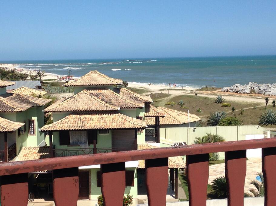 Vista da cobertura, varanda, quarto e sala.