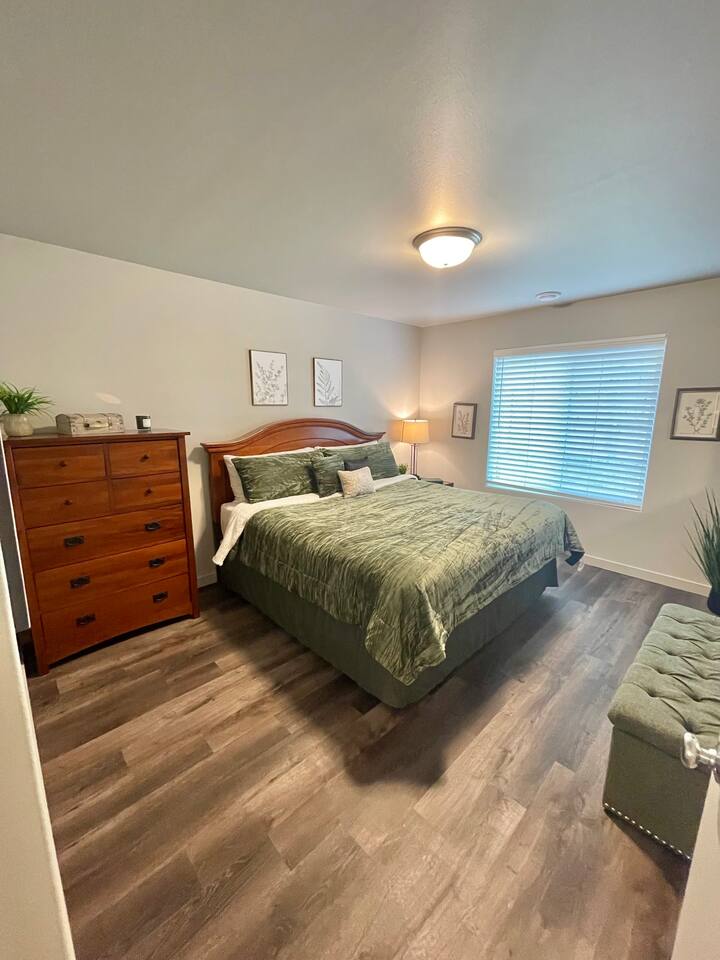King sized bed in the spacious master bedroom.