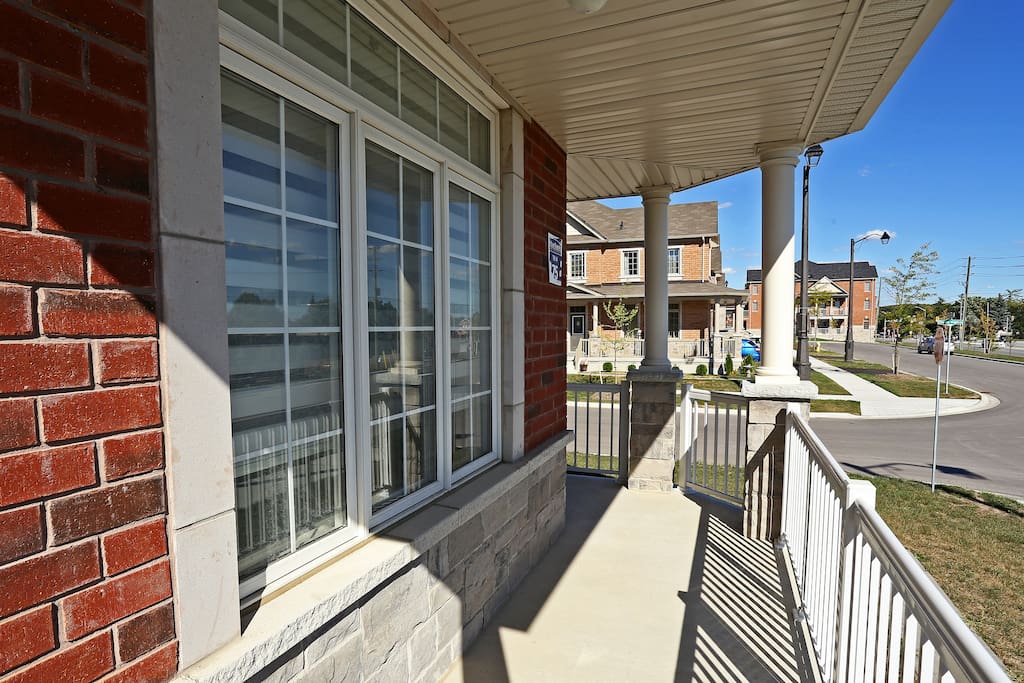 Wrap-around covered porch overlooks the street.