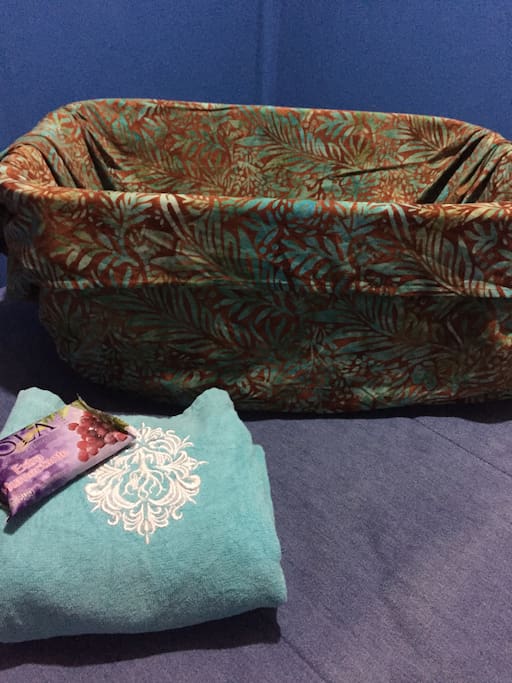 A basket for you clothing as well a clean towel and clean soap!!
