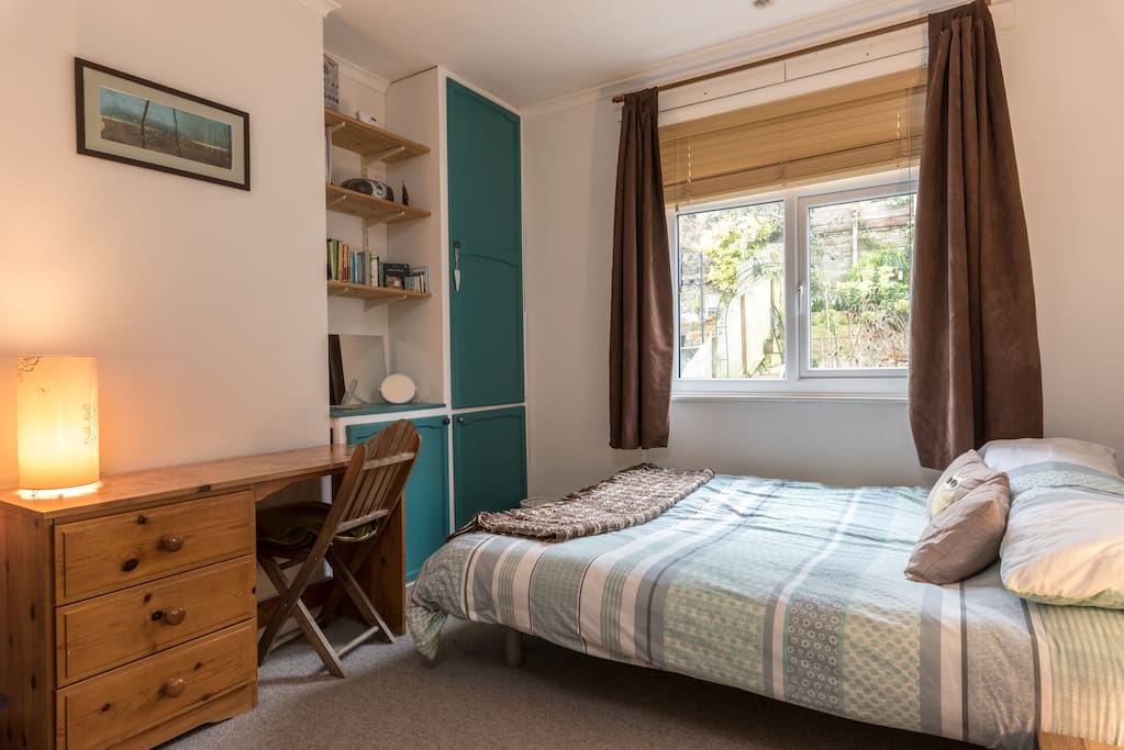 Cosy kingsize bed with memory foam topper.