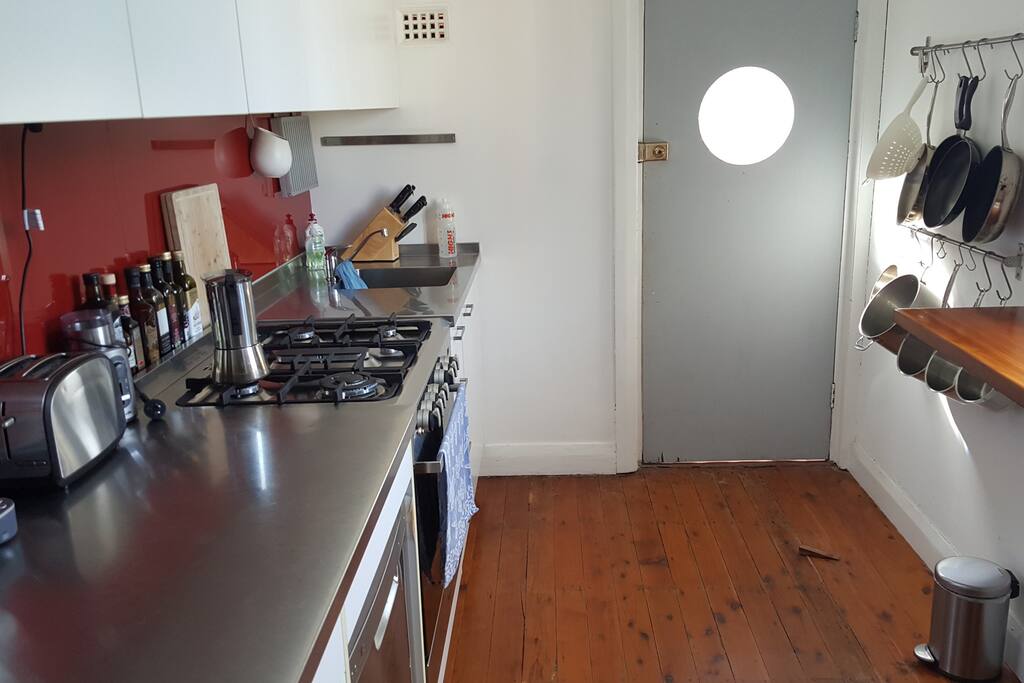 Kitchen with access to rear yard