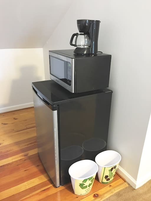 Kitchen nook complete with Keurig, microwave and refrigerator. We offer complimentary bottled water and coffee.