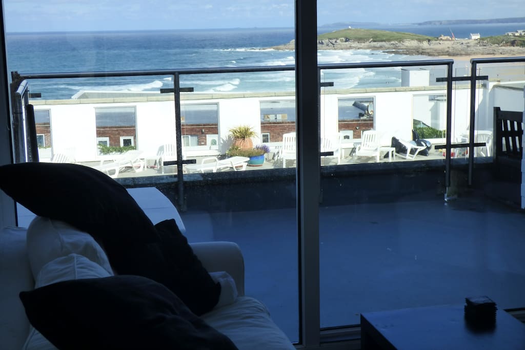 View of the private pool and Fistral Beach from the lounge