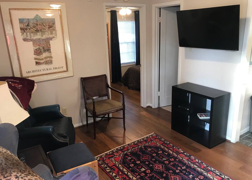 Living Room with big screen TV and cable