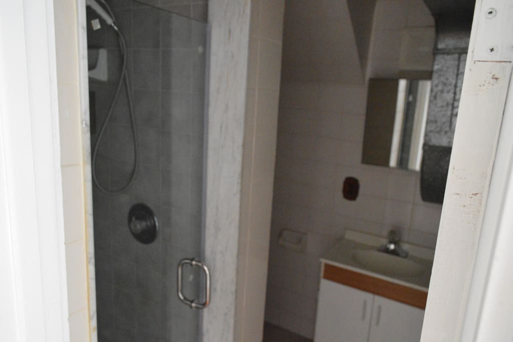 A private washroom with shower.