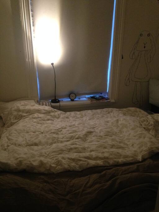 Queen size bed (150X210cm) in a room just a bit larger than the bed itself