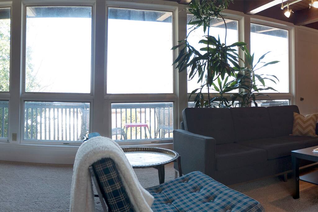 Looking from the area between the kitchen and dining room towards the deck.