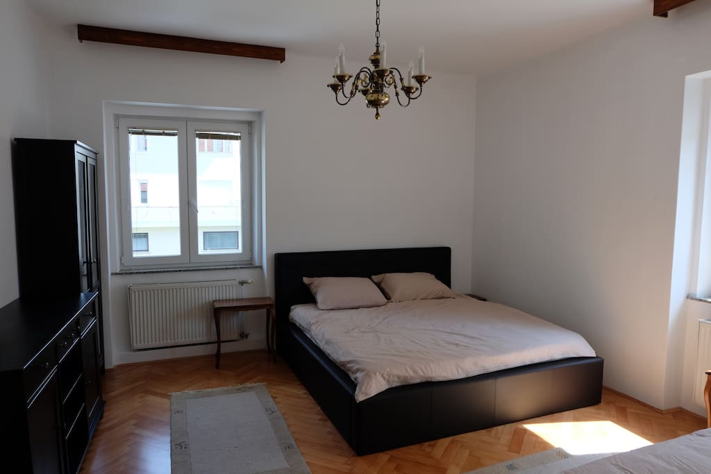 Master bedroom with an extra bed.