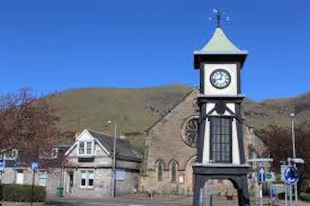 The property is opposite the village clock