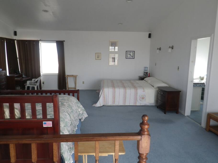The luxury suite has porch overlooking the town with views of the lagoon as well as the ocean.