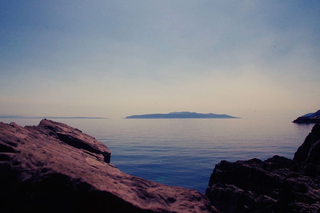 Beautiful sunset view on island Cres from walking trail that goes trough Ika.