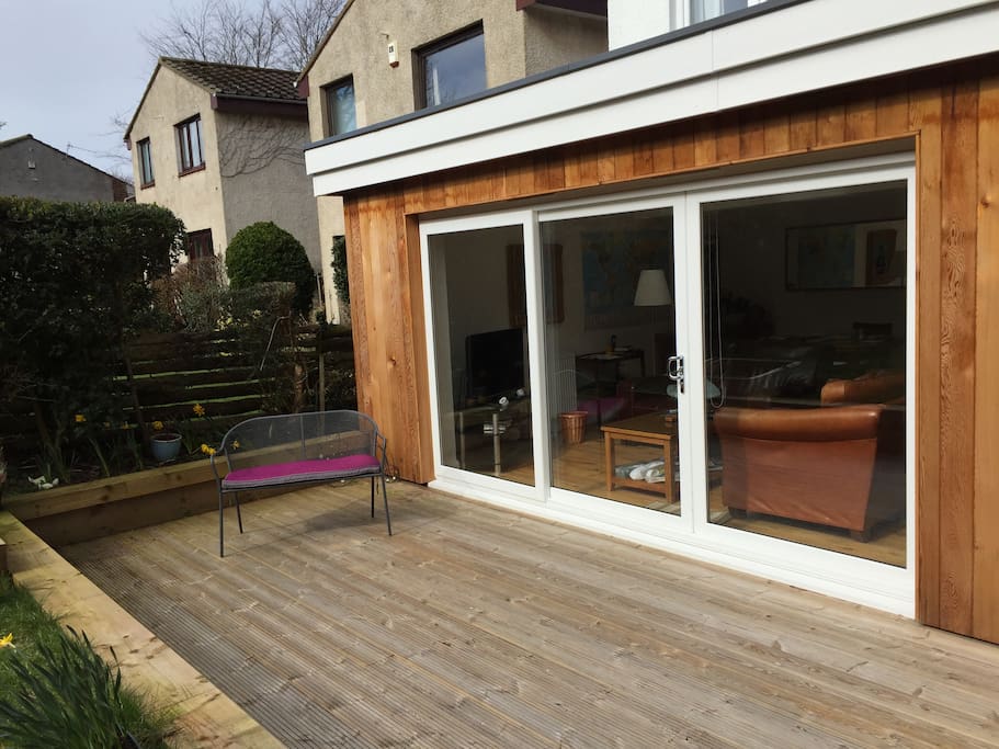 Lovely outdoor seating area for those sunny days.