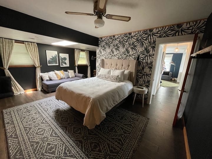 Downstairs guest bedroom with queen bed, and twin daybed that folds out to another queen (floor) sleeper. 