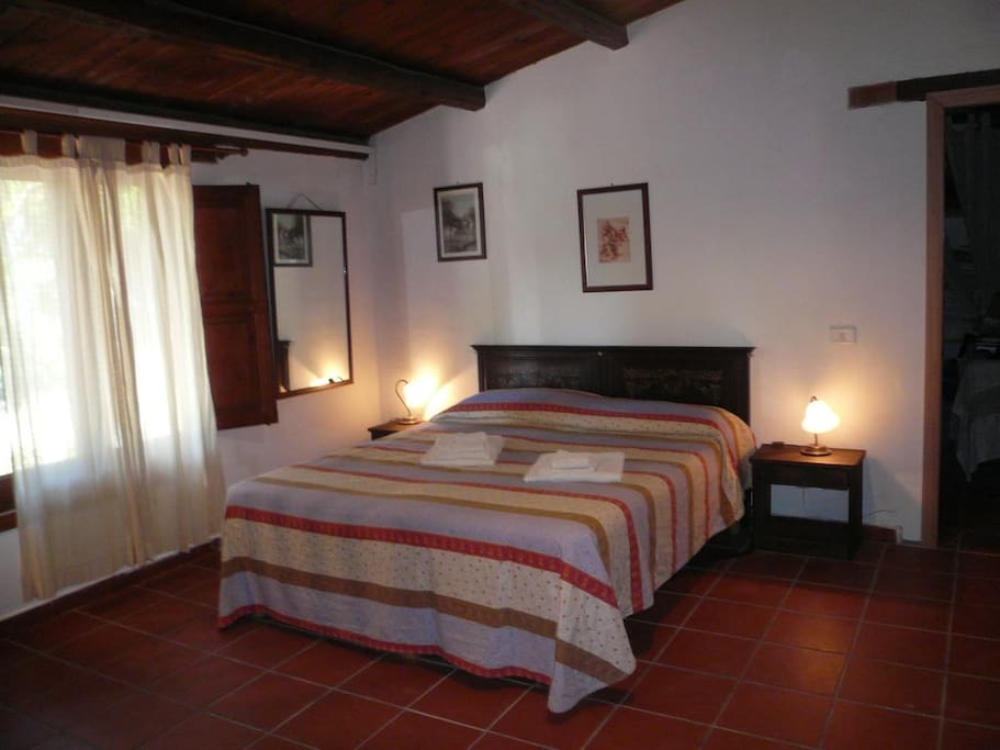 bedroom with three single beds (two of the beds have been put together on this photo)