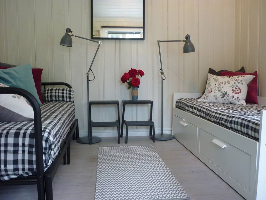 Room: Here are the two day-beds. Typical wooden floor.
