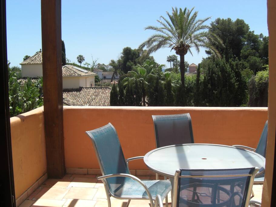 Terrace south oriented with views to tropical gardens