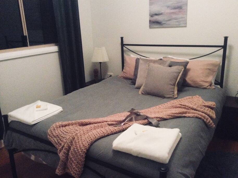 Queen bed with cupboard for storage
