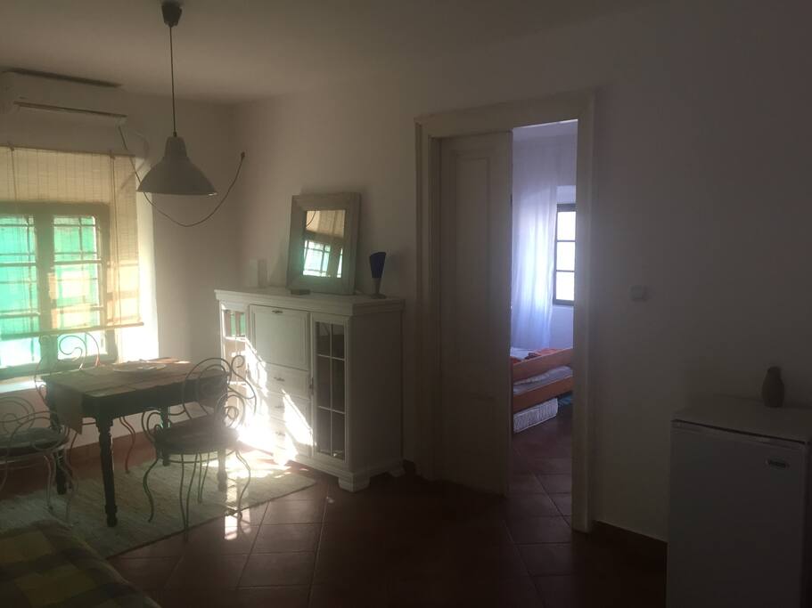 living room w/ entrance to bedroom
