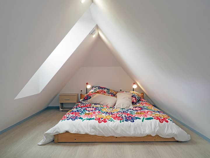 To sleep under the stars in the mezzanine in a queen-size bed