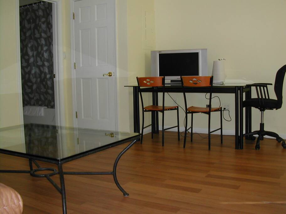 Living area leading to private bathroom